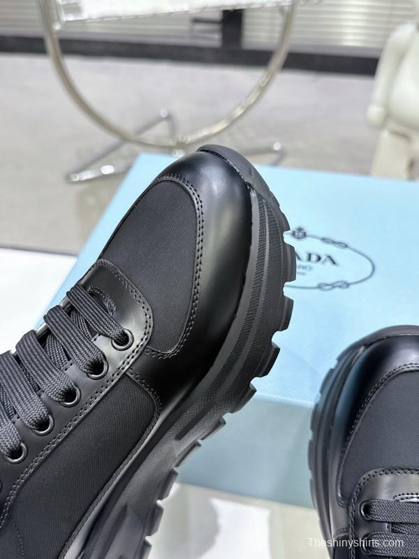 2025 Unisex Prada Black Leather Sneakers KFY00310